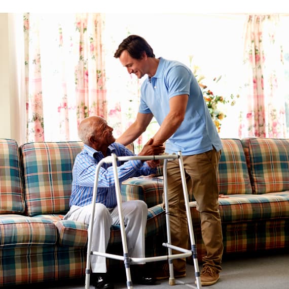 IHSS caregiver helping patient in Fresno